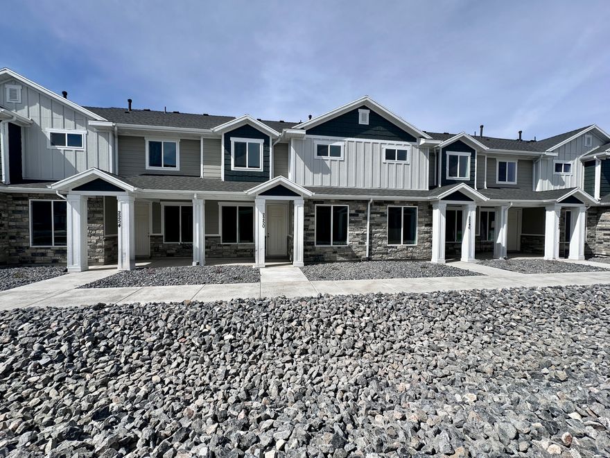 *NEW* townhome with a HUGE PRICE IMPROVEMENT and concession of $10,200 near Firefly Park that is Move-In Ready! Main level features 9' ceilings, LVP flooring, and an open layout with a bright great room. Kitchen includes painted gray cabinets, granite countertops, pantry, and a large island. Upstairs offers 3 bedrooms, spacious primary suite with tray ceiling, separate tub/shower, enclosed water closet, walk-in closet, and a bonus office/reading nook. Builder + lender incentives: 3% toward closing costs plus $1,500 with preferred lender. *Some pictures are of a similar unit with same selections