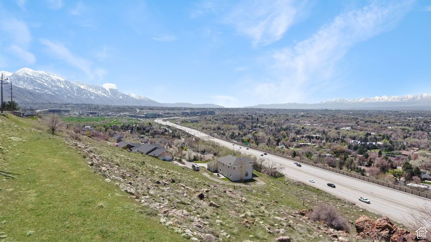 With stunning views over Salt Lake Valley and beyond, this vacant 2.01-acre lot is an absolute must-see for anyone seeking a relaxed, private and secluded lifestyle. Build your dream home with a sweeping deck where you can take in the breathtaking vista of the Oquirrh Mountains and downtown Salt Lake City. This sprawling block is nestled at the base of Mount Olympus in the highly-desired locale of Holladay. With very few neighbors and a central location just moments from Big Cottonwood Canyon and Parley's Canyon, you will love the peace and privacy this lot offers. You can choose to enjoy this large lot all to yourself or subdivide into two lots. If you want to share this lot, buyers will love the many hiking trails located near-by as well as the Old Mill Golf Course and Old Mill Business Park. Restaurants, bars and shops are also within easy reach. This is an exciting yet rare opportunity to build on the mountainside and with water, gas, electrical and telephone services already run to the property and access to the sewer, all you need to do is get busy planning your home.