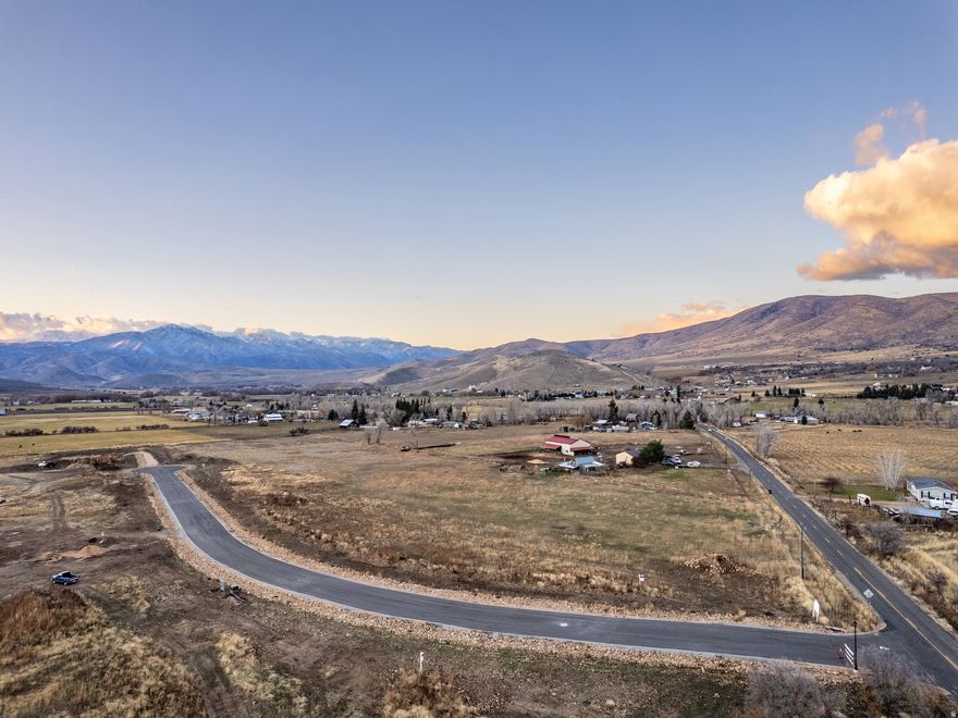 Discover the perfect setting for your dream mountain retreat on this beautiful prepared 5.5 acre property tucked away in a peaceful cul-de-sac in Wallsburg!  This turn-key lot is ready for immediate construction, allowing you to bring your vision to life right away.  This property includes water shares needed to build.    Surrounded by majestic mounain views and a serene valley setting, the land offers ample room for your luxury home, additional structures, and outdoor living spaces as well as horses.  Despite it's peacful rural setting, you'll be conveniently located within an hour of Salt Lake, Park City, Provo, Sundance and minutes from Heber.  Ski in Utahs iconic ski destinations like Park City, Snowbird, Deer Valley and Sundance and spend the summers boating, fishing, and paddleboarding at Deer Creek Reservior just minutes away.  This rare combination of privacy, natural beauty, and convenient access to world-class recreation makes this property an exceptional opportunity to create your dream mountain lifestyle.   Buyer to verify all details