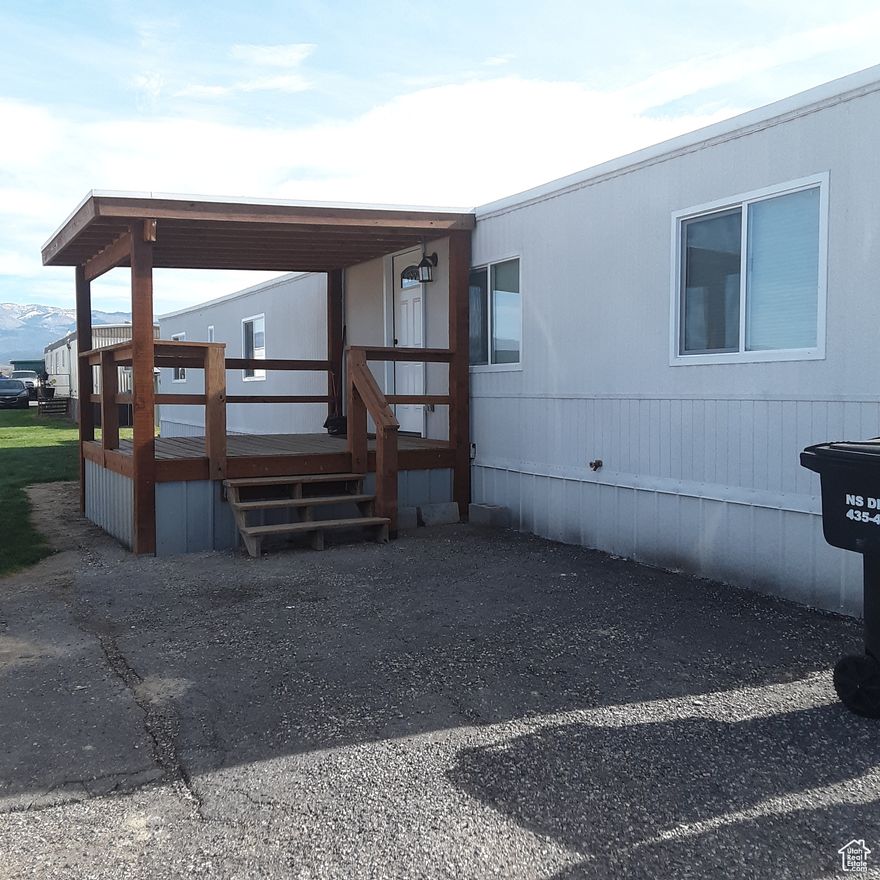 EXCELLENT RECREATIONAL . Completely remodeled, like new, primary or secondary home located in this beautiful park, with well maintained grassy areas around each trailer pad. This is a one of a kind, open rural location with gorgeous mountain views, close to all types of recreational activities, fishing, hunting, mountain ATV trails and more. ALTHOUGH THIS WAS AN OLDER TRAILER, IT RECEIVED AN ENTIRE MAKEOVER AND IS NOW NICER THEN MOST NEW TRAILERS. All walls and inside framing were removed, including the outside walls. The ceiling and roof surface were removed and the framing for the roof was reinforced throughout and new insulation installed. The outside frame was cleaned and reinforced with new studs and insulation. Rooms were re-framed with new wood , and new drywall was installed throughout, including the ceiling. All interior sheetrock was newly painted. New closets were added to two of the bedrooms which had none. Additionally new closet doors were added to the master closet. All plumbing and electrical wiring replaced...including new light fixtures and electrical outlets installed, and a new electric water heater. All new duct work was added with new vent covers and a new furnace and air conditioner were installed. All windows were replaced with new, energy efficient window and pleated honeycomb shades blinds with lift. Sub floor was completely replaced and new contemporary laminate flooring was installed throughout entire house. New front and back doors were replace as well as all interior doors with top quality doors and hardware. Kitchen was reconfigured and has all new cabinetry with soft closed doors and drawers, counter tops, sink, lighting and appliances(stove, microwave with vent, and refrigerator). Bathroom was also reconfigured and has all new bathroom fixtures, vanity, and storage shelves installed. New skirting was built around the home, outside siding repaired, and all of the siding and skirting was painted with thermal cork shield paint adding insulation and water proofing to the home. Front porch was updated with railings, porch roof framing was replaced and new steps were built on the back door. A new TPO roof was installed on entire house and front porch. The osmosis unit under the kitchen sink is required and was installed by and belongs to Chester Mobile Home Park.
