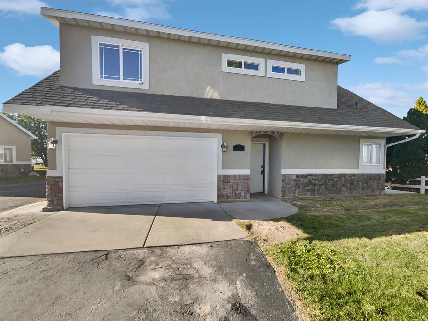 100-Day Home Warranty coverage available at closing. Welcome to this beautifully updated 3 bedroom, 2.5 bath home in Saratoga Springs, where fresh, modern finishes meet an active, outdoor-focused lifestyle. Step inside to find bright interior paint, updated flooring, and an open floor plan that makes everyday living feel connected, easy, and inviting. The kitchen shines with sleek quartz counters, stainless steel appliances, and great flow into the living areas - perfect for hosting companion or enjoying quiet evenings at home. A brand-new HVAC system (installed August 2025) brings added comfort and peace of mind. Upstairs, the bedrooms offer comfortable retreats, with plenty of natural light and thoughtful layout. The 2-car garage provides storage and convenience for gear, hobbies, and daily life. Outside, the Saratoga Springs lifestyle is right at your doorstep. Enjoy neighborhood parks and green spaces, along with effortless access to miles of mountain trails, ideal for hiking, biking, and taking in the stunning scenery. 100-Day Home Warranty coverage available at closing