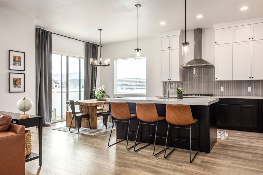 Better than new-this nearly brand-new home delivers modern luxury, open-space privacy, and exceptional flexibility without the wait. Less than 18 months old and completely turn-key, this thoughtfully designed residence offers primary-floor living, soaring vaulted ceilings, and a bright, open layout that lives beautifully for both full-time owners and investors-all just 15 minutes from both Deer Valley Resort and Sundance Resort. With 5 bedrooms, 3 bathrooms, and a spacious 3-car garage, the home provides ample space for family, guests, or rental income potential. Positioned to capture the benefits of open space and lower-density surroundings, the setting offers a rare sense of privacy and breathing room while maintaining easy access to world-class recreation, dining, and year-round amenities. Designed for today's lifestyle, this property is nightly-rental approved with a minimum one-night stay, making it an exceptional opportunity for short-term rental income, second-home ownership, or a flexible primary residence. Every detail is complete and move-in ready-no construction delays, no upgrades needed, just immediate enjoyment or income. Whether you're seeking single-level convenience, a lock-and-leave investment, or a like-new home in a low-density open-space setting near Utah's premier mountain resorts, this property stands out as a rare opportunity to own new construction quality without the wait. Photographs included in the listing contain virtually staging of furniture and other decor and are intended for illustrative purposes only.