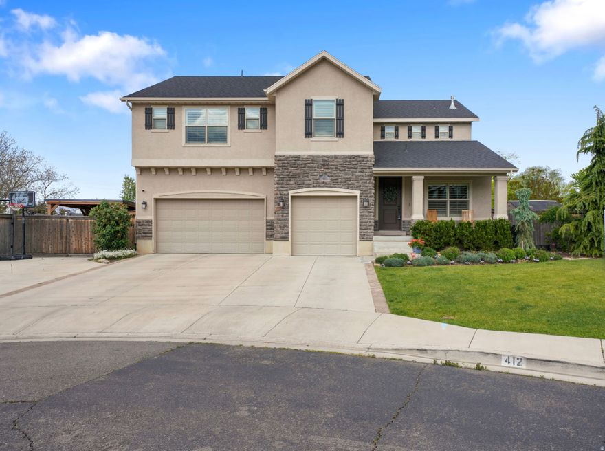 Seller open to Seller Financing!  Unobstructed Mount Timpanogos views! Perfectly positioned in a highly sought-after neighborhood, this residence offers the rare combination of walkability to schools and a nearby recreation center.  The main level showcases an open-concept design anchored by an updated kitchen and complemented by durable tile flooring, seamlessly connecting gathering spaces designed for both entertaining and refined daily living.  A 9.1 RBH surround sound system transforms the family room into a true media experience. Upstairs, thoughtful design continues with a versatile loft, multiple bedrooms and bathrooms, and second-floor laundry ideally located near the bedrooms. The primary suite offers a private retreat framed by mountain views, featuring built-in details, a spacious walk-in closet, and separate tub and shower. The walkout basement introduces an additional layer of flexibility, thoughtfully positioned with a separate entrance, multiple bedrooms, a spacious bonus room, sink, and additional laundry hookups, ideal for multigenerational living, or future income potential. Outdoors, the property transitions into a curated, low-maintenance backyard complete with high-grade artificial turf and a built-in playground, creating a polished yet functional space designed for year-round enjoyment. A covered deck extends the living experience, offering the perfect setting to take in the surrounding views. Additional highlights include covered RV parking, a storage shed, water softener, and generous storage throughout.