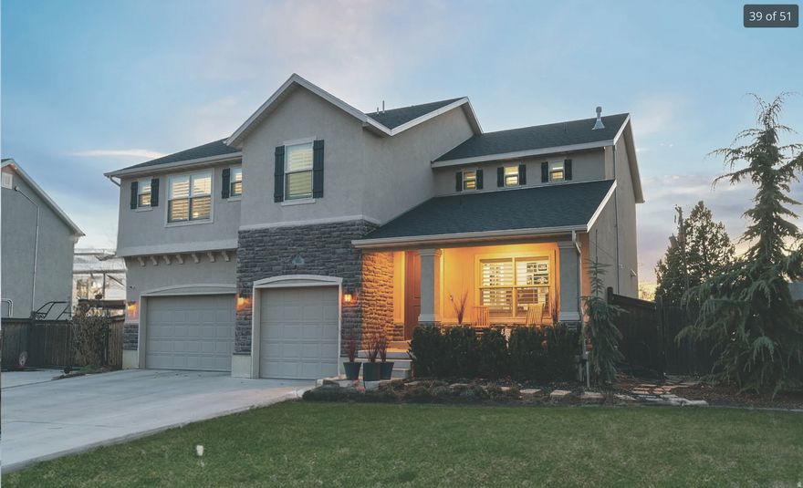 Unobstructed Mount Timpanogos views! Perfectly positioned in a highly sought-after neighborhood, this residence offers the rare combination of walkability to schools and a nearby recreation center.  The main level showcases an open-concept design anchored by an updated kitchen and complemented by durable tile flooring, seamlessly connecting gathering spaces designed for both entertaining and refined daily living.  A 9.1 RBH surround sound system transforms the family room into a true media experience. Upstairs, thoughtful design continues with a versatile loft, multiple bedrooms and bathrooms, and second-floor laundry ideally located near the bedrooms. The primary suite offers a private retreat framed by mountain views, featuring built-in details, a spacious walk-in closet, and separate tub and shower. The walkout basement introduces an additional layer of flexibility, thoughtfully positioned with a separate entrance, multiple bedrooms, a spacious bonus room, sink, and additional laundry hookups, ideal for multigenerational living, or future income potential. Outdoors, the property transitions into a curated, low-maintenance backyard complete with high-grade artificial turf and a built-in playground, creating a polished yet functional space designed for year-round enjoyment. A covered deck extends the living experience, offering the perfect setting to take in the surrounding views. Additional highlights include covered RV parking, a storage shed, water softener, and generous storage throughout.