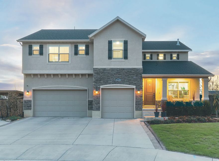 Unobstructed Mount Timpanogos views! Perfectly positioned in a highly sought-after neighborhood, this residence offers the rare combination of walkability to schools and a nearby recreation center.  The main level showcases an open-concept design anchored by an updated kitchen and complemented by durable tile flooring, seamlessly connecting gathering spaces designed for both entertaining and refined daily living.  A 9.1 RBH surround sound system transforms the family room into a true media experience. Upstairs, thoughtful design continues with a versatile loft, multiple bedrooms and bathrooms, and second-floor laundry ideally located near the bedrooms. The primary suite offers a private retreat framed by mountain views, featuring built-in details, a spacious walk-in closet, and separate tub and shower. The walkout basement introduces an additional layer of flexibility, thoughtfully positioned with a separate entrance, multiple bedrooms, a spacious bonus room, sink, and additional laundry hookups, ideal for multigenerational living, or future income potential. Outdoors, the property transitions into a curated, low-maintenance backyard complete with high-grade artificial turf and a built-in playground, creating a polished yet functional space designed for year-round enjoyment. A covered deck extends the living experience, offering the perfect setting to take in the surrounding views. Additional highlights include covered RV parking, a storage shed, water softener, and generous storage throughout.