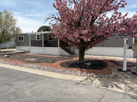 Photo of 745 W MONTE BLANCO St #106, Taylorsville, UT 84123 (MLS # 2150028)