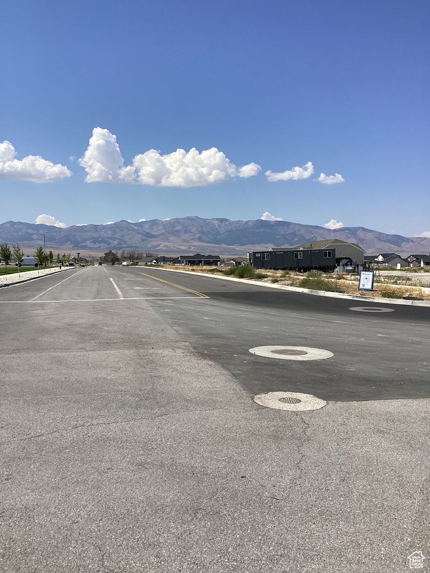 39.08 acres prime location in Grantsville, Tooele County, Utah.  West fence line borders new 20 Wells Elementary, north fence line boarders Anderson Ranches.  Views of Stansbury Mountains including Deseret Peak.