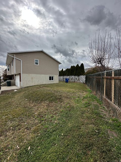 Tiny photo for 3876 S BURNINGHAM DR W, West Valley City, UT 84119 (MLS # 2139509)