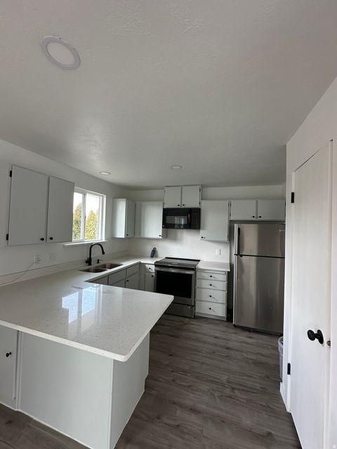Tiny photo for 3876 S BURNINGHAM DR W, West Valley City, UT 84119 (MLS # 2139509)