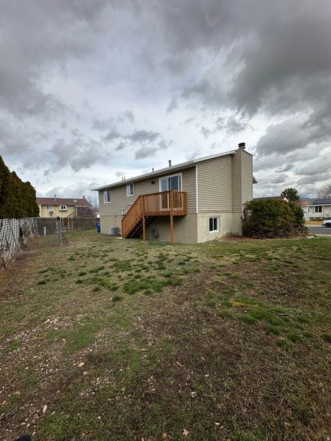 Tiny photo for 3876 S BURNINGHAM DR W, West Valley City, UT 84119 (MLS # 2139509)
