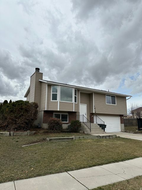 Tiny photo for 3876 S BURNINGHAM DR W, West Valley City, UT 84119 (MLS # 2139509)