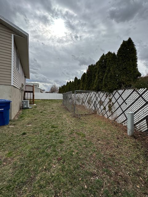 Tiny photo for 3876 S BURNINGHAM DR W, West Valley City, UT 84119 (MLS # 2139509)