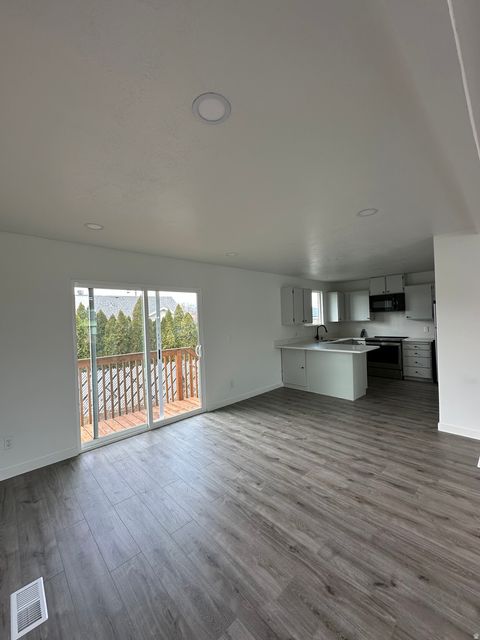 Tiny photo for 3876 S BURNINGHAM DR W, West Valley City, UT 84119 (MLS # 2139509)