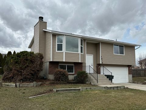 Photo of 3876 S BURNINGHAM DR W, West Valley City, UT 84119 (MLS # 2139509)