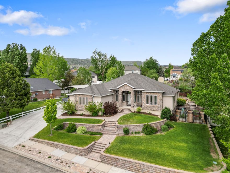 Welcome Home! Located in the desireable neighborhood of Timp Meadows, this home boasts an upgraded kitchen, upgraded lighting and upgraded primary suite. Tall ceilings lend airiness and comfort to the elegant main floor with gas fireplace, plenty of windows for natural light and easy flow to the spacious dining and kitchen area. The luxurious primary suite has a tray ceiling, 3 sets of French doors, soaker tub, walk-in closet and separate vanities.The office has a captivating view of Timp and shares a Jack and Jill bath with a second bedroom. The just-painted basement with new carpet is fully finished with plenty of room for family, friends and relatives with bedrooms, a large gathering area, plenty of storage and a 2nd laundry room. The beautiful back yard features an east-facing covered deck for enjoyable afternoons out of the hot sun, dedicated garden area on the south side with raised beds and gravel walkways and wood-burning fire pit with dramatic stone seating for s'mores and stories. Come see what Heber has to offer: clean air, 12 min to Deer Valley East Village ski resort, 25 min to Park City and Provo, 45 to SLC airport, and abundant year-round outdoor activities including 108 championship holes of golf, blue-ribbon fishing, hiking, biking, skiing, and snowmobiling. This is your place!