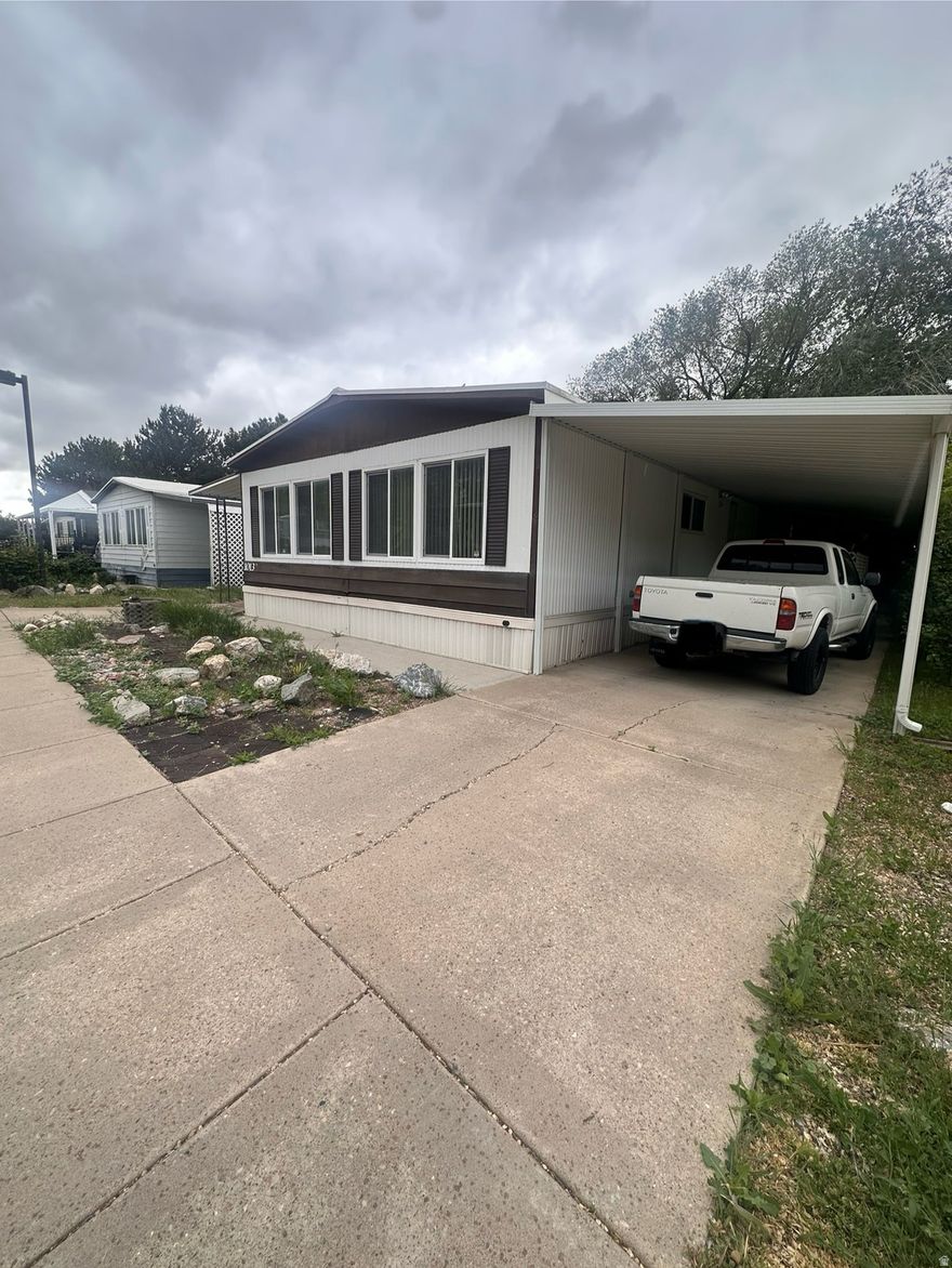 Great double wide at a DISCOUNTED PRICE. SOLD AS IS MOVE IN READY. PICTURES TELL IT ALL. CALL PARK FOR PARK APPLICATION, RULES, and LOT RENT.