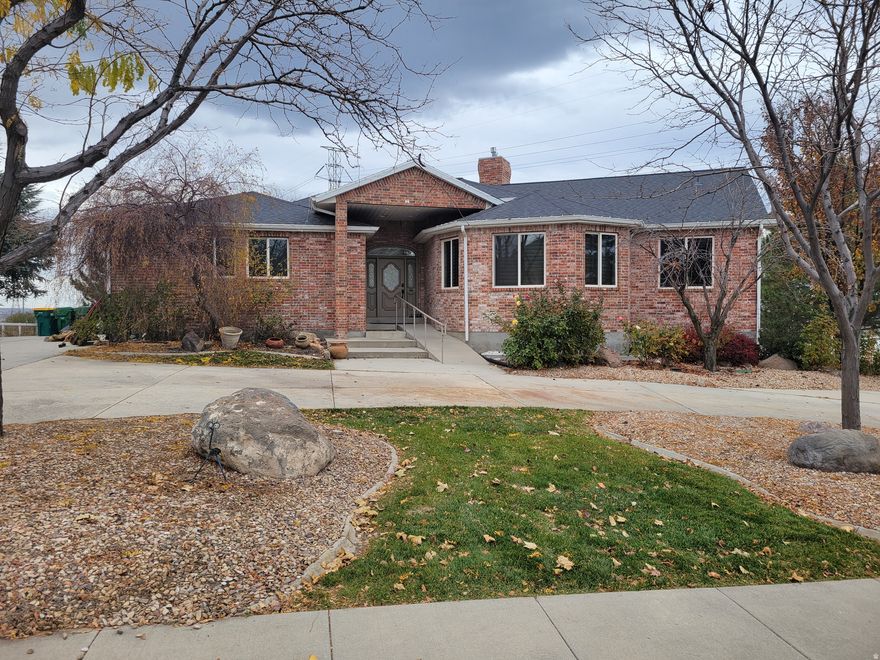 AmazingBluffdale horse property with barn PLUS an extra 1.5 acres which can be leased for only $600 per year! The list of updated items on this property is extensive- New roof and solar panels (52) with a Generac back up battery (14KW) installed in 2021. Electrical service upgraded from 100 amp to 200 amp in the house and barn. New furnace and AC units installed in thehouse and barn in 2021. New tankless water heater and water softener. New pool liner, pump, filter and cover. Remodeled main kitchen with quartzite counter tops and beautiful slate tiling. and new kitchen downstairs. Updated master bathroom that is handicap accessible with walk in shower spa and garden tub. New carport- hay cover by the barn. RV 50 amp plug and water connection by the barn.There is a fenced coral area behind the barn that also connects to the extra 1.5 acres. Unmetered secondary water. LOTS of new fencing around the property. New barn roof. The down stairs has 3 ground level walk out doors and lots of light. Could easily be a Mother in Law apartment with 3 bedrooms.