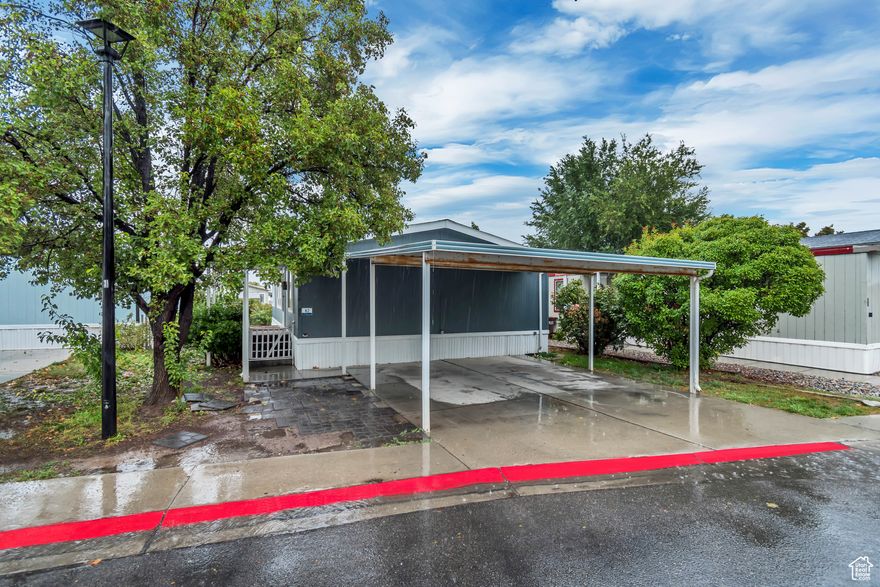 Located in the quiet and welcoming Riverside Manufactured Home Community, this all-ages park caters to families and young professionals alike. Conveniently located near freeway access, shopping, parks and schools, this home has it all. Vaulted ceilings, fully electric (no gas bill!), a modern open floorplan and a large master suite are just some of the features this 3 bedroom, 2 bath home offers. With a large front porch, you can entertain inside and out. The front porch can be partially enclosed with retractable sun shades, the private yard is fully fenced and there is parking for 3 vehicles. This home is move-in ready, new water heater, newer remodeled bathrooms, newer paint and carpet. Must be park-approved.
