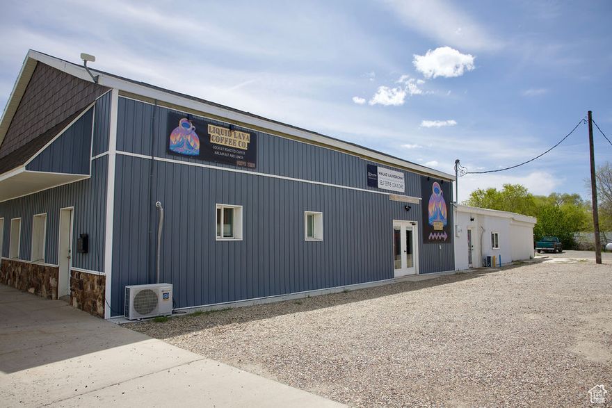 Commercial Building for Sale  Malad, Idaho Fantastic investment opportunity right on Bannock Street in Malad! This recently remodeled commercial building features five individual spaces, offering great income potential. Spaces 1 and 2 are currently rented, providing immediate cash flow.  The 3rd space is a fully equipped, turn-key laundromat that will be sold with the building-ready to operate from day one!  Spaces 4 and 5 offer excellent potential for future businesses, perfect for retail, offices, or service-based ventures.  Prime location with excellent visibility and steady traffic. Don't miss this opportunity to own a beautifully updated and versatile commercial property in the heart of Malad!  The property offers convenient Bannock Street access; however, there is no drive-through access on the east side of the building.   Square footage figures are provided as a courtesy estimate only and were obtained from __appraiser________ .  Buyer is advised to obtain an independent measurement.