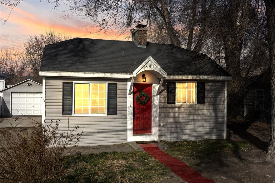 Reimagined Provo Classic! Tucked away in the heart of Provo this darling bungalow is the perfect blend of vintage charm and modern comfort. Every inch inside has been thoughtfully refreshed, featuring a brand-new kitchen with new cabinets, updated bathrooms with new vanities, fresh paint, wood floor and plush new carpet throughout. The original character remains, but the feel is clean, bright, and move-in ready. Step outside to your own private yard and detached garage with a workshop- perfect for hobbies, projects, or extra storage. This is one of those homes that just feels good the moment you walk in. WATCH FULL TOUR HERE: https://youtu.be/_ANYrVqTC10