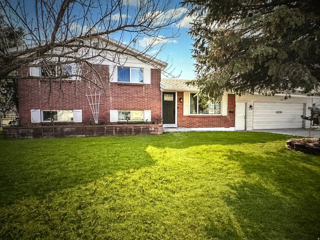 Photo of 1901 W KIRKHAM WAY S, Taylorsville, UT 84129 (MLS # 2142596)