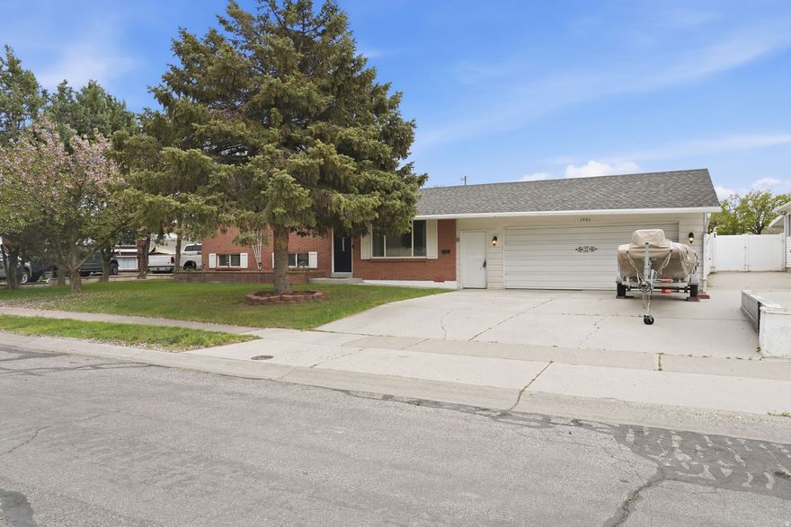 Honey STOP the car This is the one LOOK! Its a 3 bed with 2 baths and a 2 car garage, look at  the big back yard with a covered  patio, the kitchen is super nice and fresh, its even close to freeways and shopping,right in the best part of Taylorsville This is a must see!!!
