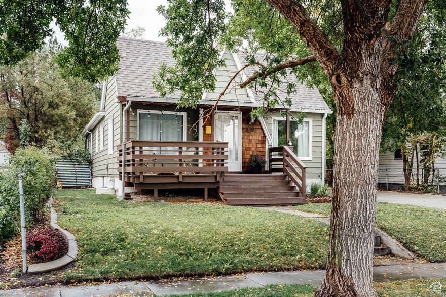 Located in the heart of Liberty Wells, this five-bedroom, two bath home is both charming and functional -designed with space for gathering, living, and enjoying everyday life. The welcoming front porch sets the tone, perfect for quiet mornings with coffee or relaxed evenings with friends, and offers the kind of curb appeal that makes a house feel like home. Inside, new hardwood floors extend through bright, open spaces filled with natural light from large front windows. The main floor provides three bedrooms and two full bathrooms, arranged with an easy, practical flow that supports both daily living and entertaining. The main bedroom has a nice walk-in closet that supports a healthy wardrobe. On the lower level, two nicely sized bedrooms create additional flexibility for guest rooms, a workout area, home office, or a cozy media space. A second kitchen offers even more potential, ready to be updated into something that fits your lifestyle.  The outdoor spaces are just as inviting. A fully fenced backyard provides room to gather, garden, and play, with flower beds ready for planting, fruit trees to enjoy throughout the season, and herbs and tomatoes already established. A long driveway leads to a spacious two-car garage with extra room for storage, tools, or crafts, ensuring convenience and functionality for everyday use. Set in one of Salt Lake's most connected and welcoming neighborhoods, you'll enjoy easy access to restaurants, parks, schools, shopping, art, music, and nearby trails and ski resorts. This home combines comfort, location, and possibility -an opportunity to put down roots in Liberty Wells and enjoy all the best of city living with a neighborhood feel.