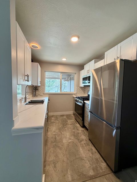 Tiny photo for 325 E 2550 N #23, North Ogden, UT 84414 (MLS # 2145105)