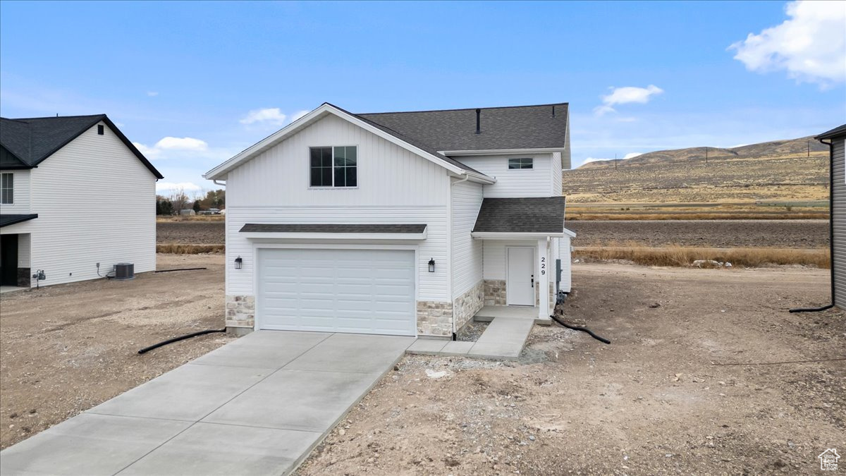 This Charming 3 Bed, 2.5 Bath New Construction Home Built by Timber Brook Homes is in a convenient, yet quiet location in Garland, Utah. Experience Rural Living in this Open Concept 'Maple' Floorplan. Complete with a Rocked Gas Fireplace, Soft-Closing Hardwood Cabinetry, and a Double-Showerhead tiled Master Shower, this home has everything you have been looking for at an affordable price point. This home is Under Construction, with Completion scheduled for February 28, 2025. Pictures are of another nearby home with the same Maple floorplan and similar finishes. Timber Brook Homes will soon be bringing other floorplans to the market in this area, and is willing to do showings of these also upon request.