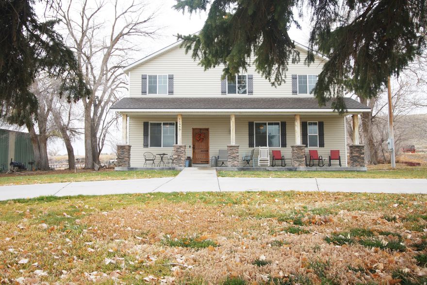 Custom Built 4 Bedroom, 3.5 bath 2-Story Home, with a Welcoming Circle Driveway, Covered Patio, Knotty Alder Cabinets, with Granite Countertops throughout, and Warm Hardwood Floors. Master en-suite with Separate Glass Shower and Soak Tub, with a Large Walk-in Closet. Theater Room with Surround Sound. 2 Large Storage Rooms. Tucked Away, Surrounded by Trees. 2,812 sf, Shop with 2 Large Bays and a 2 Car Detached Garage. Pump House to Water Lawn. Raised Garden Beds. Room for Livestock, Horses, etc. RV Parking and Septic Hook-up.