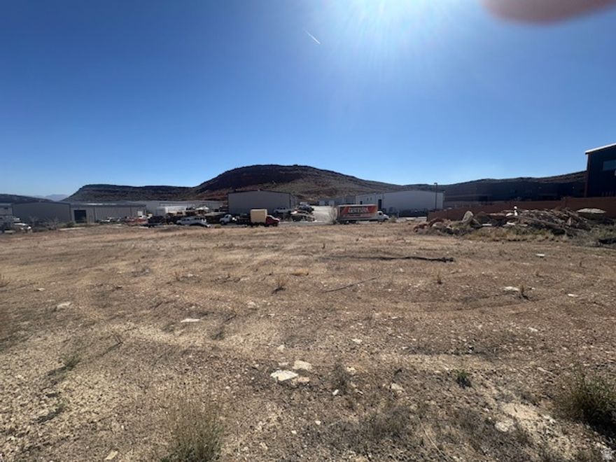 0.74 FLAT LOT IN FAIRGROUND INDUSTRIAL PARK BEHIND WHEELER MACHINERY NEAR THE DMV AND FAIR PARK.  EASY ACCESS TO 1-15.  UTILITIES STUBBED AND AVAILABLE TO PROPERY.  BUYER TO VERIFY ACCURACY OF ALL INFORMATION.