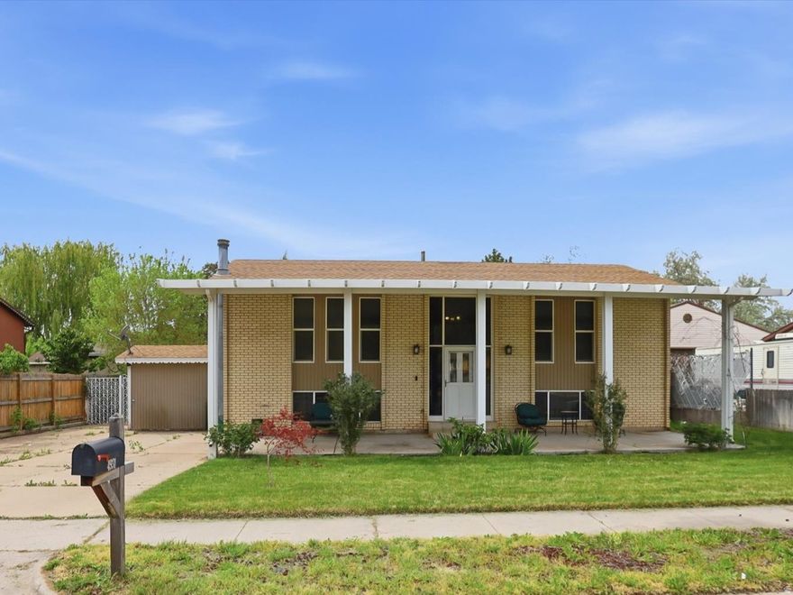 This inviting 3-bedroom, 2-bath home blends curb appeal with practical living: a beautiful, oversized front porch, private fenced yard, and both a patio and deck create ample outdoor spaces for dining, play, and entertaining. The spacious primary bedroom serves as a serene retreat, and a generous lower-level family room with a walk-out expands your living options-perfect for media nights, a playroom, or guest space. Thoughtfully designed indoor and outdoor areas make this property ideal for buyers seeking comfort, versatility, and easy entertaining. Square footage figures are provided as a courtesy estimate only and were obtained from Weber County records. Buyer is advised to obtain an independent measurement.