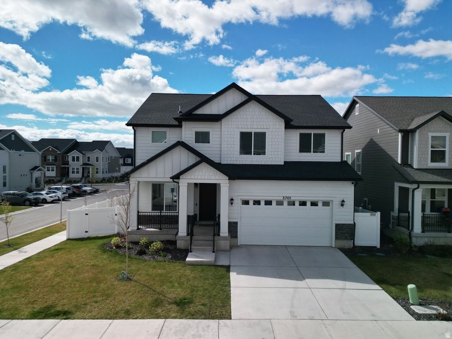 5-bedroom Edge Kate floor plan featuring a bright, open layout, spacious living areas, and a private primary suite. Functional kitchen and a fully usable yard in a quiet Lehi neighborhood. Conveniently located near shopping, dining, and I-15/Silicon Slopes. Schedule your showing today!