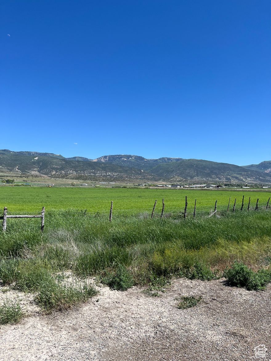 This recently annexed parcel located on the East side of Highway 89 has many possibilities for new development. It is zoned C 2  for residential, commercial, multi-housing, agricultural or a mixture of those. 863 feet of Highway frontage!