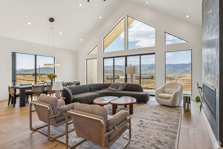 From the sleek design to the extraordinary amenities, this property is more than a home - it's a lifestyle. Designed by renowned architect Brian Hebdonu, this brand-new 7,336sq ft Scandinavian-inspired estate redefines mountain luxury. Set on 3 private acres, the property has been thoughtfully landscaped to embrace natural mountain beauty while ensuring privacy. Beyond the possibility of a second structure, the property is ideal for mountain biking, gardening, or equestrian pursuits. A stunning stone landing above provides a private dining retreat, perfectly framed by mountain views. The home's design seamlessly blends modern sophistication with comfort. Expansive living spaces flow outside to a deck off the living room, offering a natural extension for indoor-outdoor living. With natural light flowing throughout the house at all times of the day, this property really lights up. Inside, the home features 5 bedrooms, including four king beds and a bunk room, along with 4 bathrooms and 2 powder baths. A private office and versatile flex space provide options for a wine cellar, gun safe, or additional storage. Every lifestyle amenity has been curated: a state-of-the-art theater with a 120'' screen and Dolby surround sound, in-home gym, sauna and steam shower, a wet bar for entertaining, a pickleball/sports court, and a hot tub under the stars, creating a true retreat at home. The property also boasts extraordinary functionality: two laundry areas, storage for days, and an oversized 5-car garage (1,729 sq ft) with 672 sq ft of usable space above. Thoughtfully furnished with West Elm furniture, this turnkey residence is move-in ready.