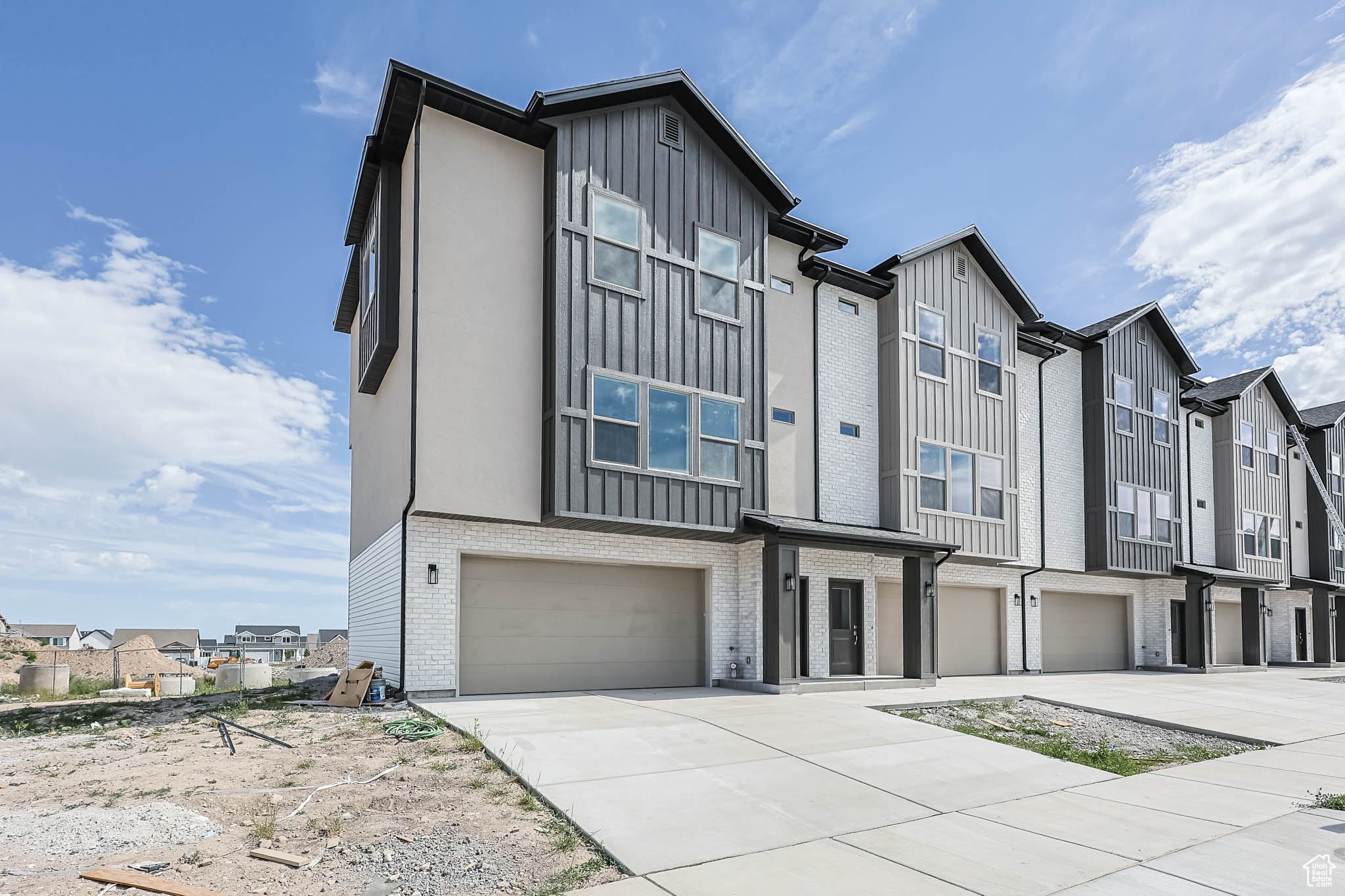 Townhomes at Lexington Greens, in Tooele. This floor plan is spacious and bright. Oversized Garage fits a mega-cab truck! The sunsets are amazing from the balcony or covered patio! 1% towards closing costs by using our preferred lender! (Photos are of the model home).