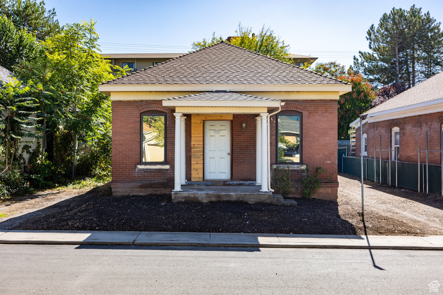 Step back in time with this classic 1904 red brick bungalow, full of character and potential. Featuring 1 bedroom (with the ability to easily add another) and 1 bathroom and a crawl space offering endless accessible storage, this historic home offers the rare opportunity to own a piece of downtown history. Located just steps from the Salt Lake City Public Library, local restaurants, shops, and UTA Trax, the home sits in a prime location that blends neighborhood charm with city living. This character rich fixer upper is the ultimate opportunity to own a home in a walkable, vibrant community! 333 E. Beldon Place is also being sold directly across the street. Make an offer on both! All information herein is deemed reliable but is not guaranteed. Buyer is responsible to verify all listing information, including square feet/acreage, to buyer's own satisfaction. Seller is the Trustee and has never occupied the property.