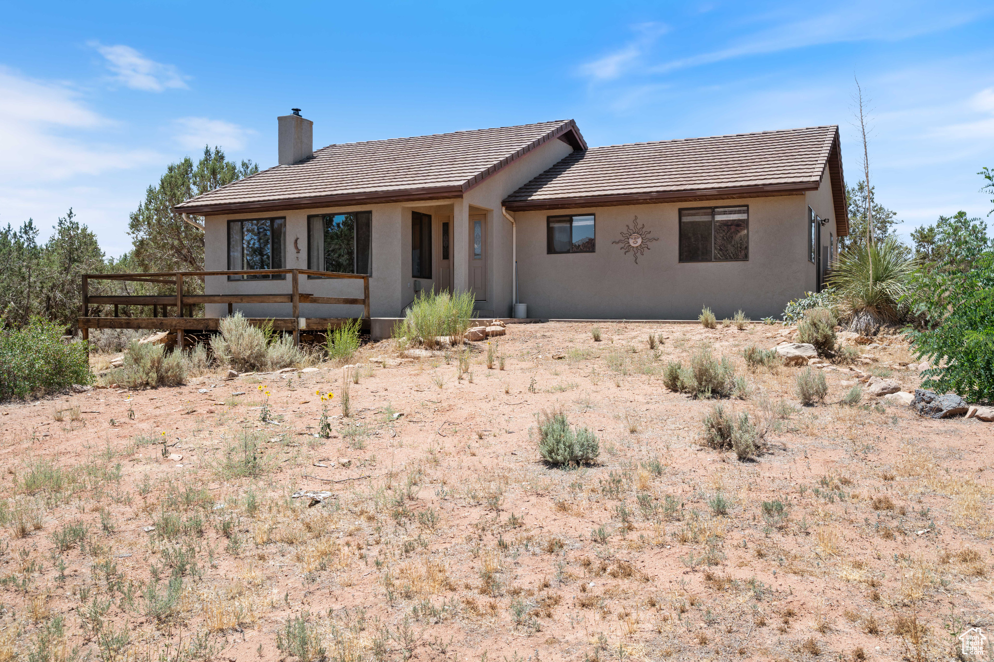 Views, Views and did we say, VIEWS! This amazing home has a front porch to the world, boasting scenic vistas of Zion National Park without paying the Zion Canyon prices. Well maintained home that is located in Southern Utah's red rock country with lots of outdoor activities at your doorstep or stay inside to enjoy the quiet serenity to comes with living on a large 1-acre lot. Nestled atop a hill, you have sweeping views of the surrounding mountains and valleys, trees and natures handiwork right in your back yard. Literally...in your yard! Stay warm by the wood burning stove or enjoy cold air conditioning on warm summer days. Great opportunity for your permanent residence, second home or getaway retreat. Come see for yourself.