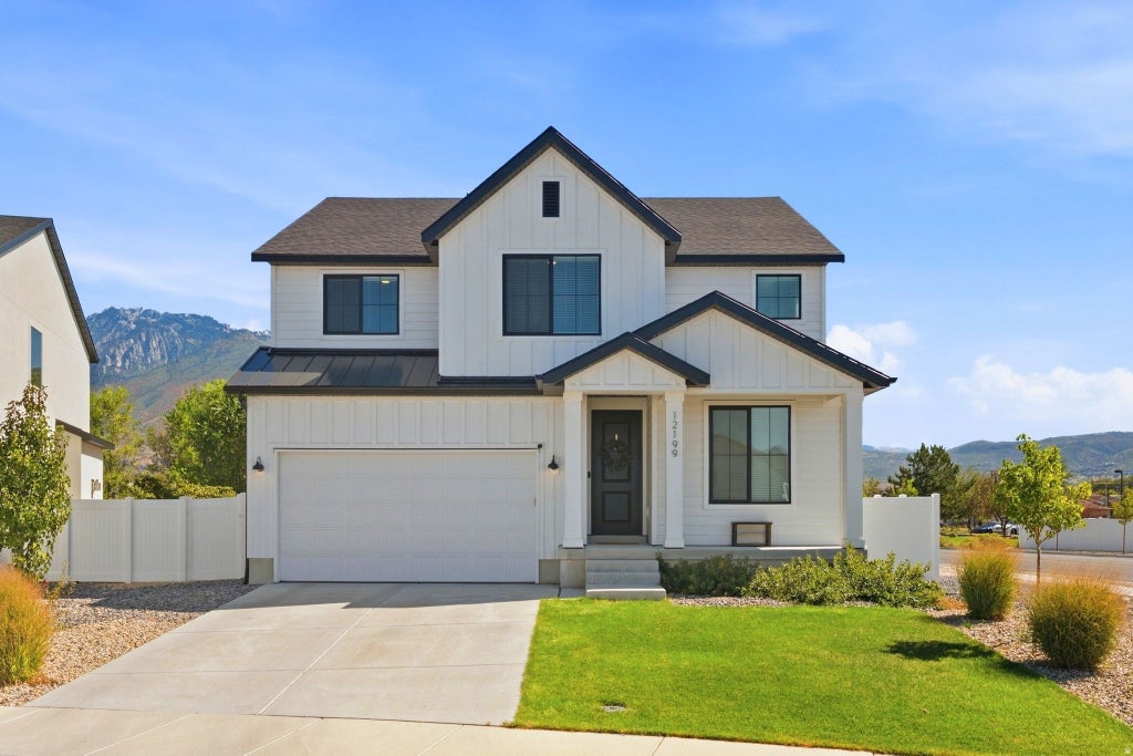 Photo of 12199 S BRINNELLI DR E, Draper, UT 84020 (MLS # 2186921)