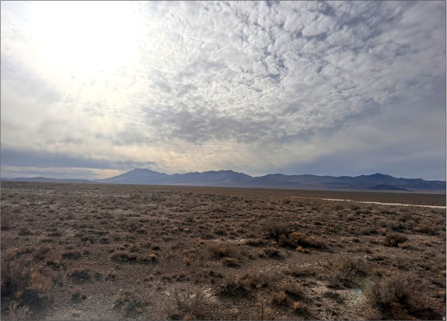 4,464.88 acres south of Lucin in western Box Elder County, Utah.  Range ground, partially fenced, and used for the grazing of cattle.  Beautiful views of the Pilot Mountain Range.  Utah Division of Water Rights Area 13 - still open to new water appropriation.  2025 Taxes: $206.95 (Greenbelt).  Zoned MU-160 (160-acre min lot size) in Box Elder County.  Elevation range: 4,400 to 4,550.  87 miles NE of Wendover, Nevada.  96 miles SW of Snowville, Utah.  208 miles NW of Salt Lake City, Utah.  Contact agent for showing instructions, maps, and directions.