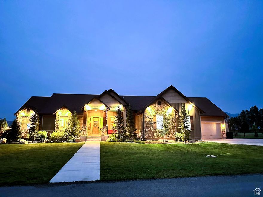 Welcome to your Oakley, Utah retreat, just minutes from vibrant Park City!  Nestled on a serene one-acre lot, this charming rambler boasts a private pond, a barn and pressurized irrigation for easy landscaping.  inside, you'll find three spacious bedrooms upstairs and three more downstairs, perfect for family or guests.  The large kitchen flows into an expansive family room with high vaulted ceilings and a cozy wood burning stove making this space ideal for family gatherings.  The oversized garage offers plenty of space.  With fresh, modern finishes throughout, this home is ready to welcome you, come see the warmth and possibilities for yourself!