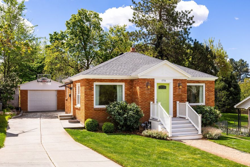 OPEN HOUSE SAT. APRIL 25th 10 - 2 PM. Sitting just a half block from the mountains and steps from scenic trails, this classic East Bench bungalow beautifully blends 1940s character with thoughtful modern updates. Meticulously maintained and move-in ready, the home features upgraded electrical, plumbing, windows, and roof, enhancing both comfort and efficiency. Inside, tasteful, high-quality finishes create a warm and inviting atmosphere. The kitchen shines with granite countertops, top of the line stainless steel appliances, including a Wolf range with an induction cooktop and quality soft-close cabinetry. Sliding glass doors lead to the spacious deck and backyard where you will enjoy your morning coffee as the sun rises over the mountain peaks, entertain with family and friends or relax in the afternoon shade beneath mature maple trees. Both bathrooms are elegantly updated with full tile surrounds and pedestal sinks, including one with a large soaking tub. The lower level offers a cozy family room, a generously sized bedroom ideal as a primary suite, and a versatile den or office that could serve as an additional bedroom. A bright spacious bathroom and laundry room complete this level. Gleaming hardwood floors, fresh paint throughout, and large windows fill the home with natural light, creating a welcoming space ready for immediate enjoyment. A newer driveway and a generously sized single-car garage add to the home's appeal. This is a rare opportunity in one of Ogden's most beloved neighborhoods.