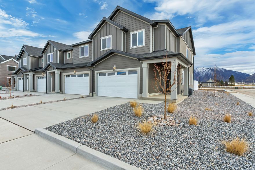 Discover the Berkeley plan, a beautifully designed townhome in the Harmony PlaceEnclave community in Salem.  The kitchen is thoughtfully appointed with premium stainless steel appliances, quartz countertops, an island for extra prep and seating space, and upgraded cabinetry for both style and storage. The primary suite offers a private ensuite with a dual-sink quartz vanity, shower/tub combo, and a door at the bath for added privacy. A second full bath with quartz countertops and a convenient powder bath with a pedestal sink ensure comfort for both residents and guests.  With 9' ceilings on the main floor, open rail detailing, pre-plumbing for a future water softener, an 8' garage door, and a keyless garage door pad, this home blends modern features with everyday convenience.  Set in the Harmony PlaceEnclave community, residents enjoy a lifestyle enhanced by parks, trails, and community amenities-all in a prime Salem location.