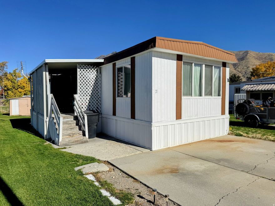 MOTIVATED SELLER! Tucked in Springville's most beautifully kept mobile home community, this 14x70 claims the best seat to those jaw-dropping mountain views you'll brag about to friends. Two bedrooms, one bath, solid bones, and priced like it's begging for your spin-grab it before someone else does! New windows, refrigerator, furnace, water heater and doors in 2009, New washer and stove in 2022. Swamp Cooler needs to be replaced due to age, owner will not replace. Conveniently located near schools, parks, and shopping. Square footage figures are provided as a courtesy estimate only. Buyer is advised to obtain an independent measurement.   Please allow 2 hours notice for showings. Use Aligned showings.   *Note that this sale is for personal property only, in the form of a mobile home.