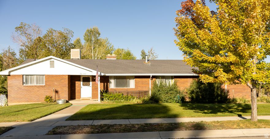 Charming single-family rambler on quiet cul-de-sac. Step into this spacious, 5 bedroom, 3 bathroom updated rambler. New flooring, paint and pluming throughout. Plenty of room for comfort and convenience. Nestled in a serene neighborhood with stunning views of the majestic mountains right from your windows. Upstairs and downstairs living spaces allow for versatile use, perfect for a home office or entertaining. Enjoy your own personal orchard with a variety of fruit-bearing trees in the backyard. Partially fenced backyard perfect for gardening, outdoor activities, and entertaining. This vintage gem is the perfect mix of old-world charm and new-world upgrades, offering comfort and style. Square footage figures are provided as a courtesy estimate only and were obtained from building records. Buyer is advised to obtain an independent measurement. Call today for a private showing!