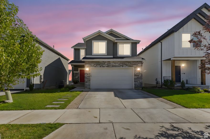 Beautiful Herriman Home with Walkout Basement! Welcome to this spacious and versatile home located in the desirable Herriman area. This property features a fully finished walkout basement complete with its own kitchen, laundry, family room, and a private bedroom-perfect for guests, extended family, or ADU rental potential. The upper level offers an open concept living space, bright natural light, and comfortable bedrooms.  Enjoy the convenience of being close to Salt Lake Community College  Herriman Campus, Rio Tinto Stadium, and Mountain View Village Shopping Center. Plus, you'll love the mountain views, fenced backyard, and easy access to schools, parks, and major roadways.  Don't miss this incredible opportunity to own a home that combines comfort, functionality, and flexibility!   Square footage figures are provided as a courtesy estimate only and were obtained from Utah county. Buyer is advised to obtain an independent measurement.