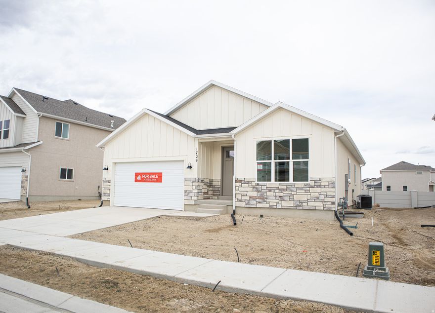 AMAZING $15,000 INCENTIVE TOWARDS CLOSING COSTS, RATE BUYDOWN, OR PRICE REDUCTION REGARDLESS OF LENDER! ALSO possible 4.99% interest rate (speak with agent for conditions)! Must-see Parkway Fields Community in Eagle Mountain! Move-in ready! This beautiful home built by Flagship Homes features 3 bedrooms, 2 bathrooms, quartz slab countertops, painted cabinets, laminate flooring on the main level, vaulted ceilings on the entire main level, landscaped front yard, decorative concrete wall on the rear of property, 2 car garage, and backyard (can be landscaped for an additional charge). The primary bedroom has a vaulted ceiling, large walk-in closet, and dual sinks with a separate tub/shower. With an unfinished basement, this home provides space for storage and room to grow. (If preferred, basement can be finished for an additional charge.) Call for more information or stop by our model home at 1546 E. Starling Lane, Eagle Mountain for a tour. Model home hours: Monday-Saturday 11 AM - 6 PM. Buyers to verify all information. Square footage is from house plans.