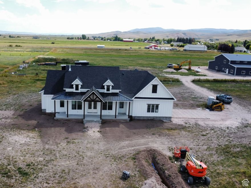 Step into your brand new custom home in Bloomington Idaho. Home sits off the street and on 2.81 acres. Vaulted ceilings in the family room, with huge windows to take in the surrounding views. Spacious, modern kitchen with a large island and pantry off the kitchen.  Master suite has a massive walk-in closet, and roomy master bathroom. Every bedroom has an attached bathroom. Home is move in ready. Come take a look today. Contact the listing agent for more info and to schedule your showings