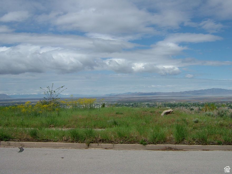Spectacular view lot in the prestigious Quailbrook neighborhood in Bountiful's east bench. Build a dream home on a lot with unobstructed views of Davis County and the Great Salt Lake. Enjoy mountain views of the Oquirrh and Stansbury Mountains, Antelope and Fremont Islands, Ben Lomond and Willard Peaks, and be within a few blocks to access all the recreation in the Wasatch-Cache National Forest. Construction materials and fill are temporarily being stored on this property from construction activity next door, and are expected to be removed in the near future. Agent related to seller.