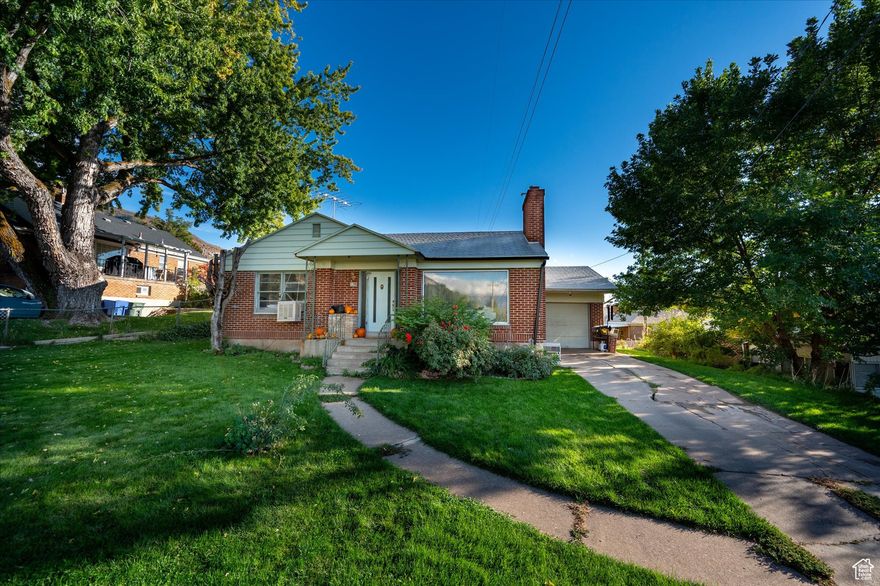 This beautifully maintained 4-bedroom, 2-bath home is perfectly situated on the desirable east bench, offering stunning mountain views and quick access to schools, hiking trails, and the golf course. The spacious layout includes a bright living area, open kitchen, and a basement plumbed for a second kitchen-ideal for a future mother-in-law suite or entertaining space. With its unbeatable location and versatile floor plan, this home offers both comfort and convenience.